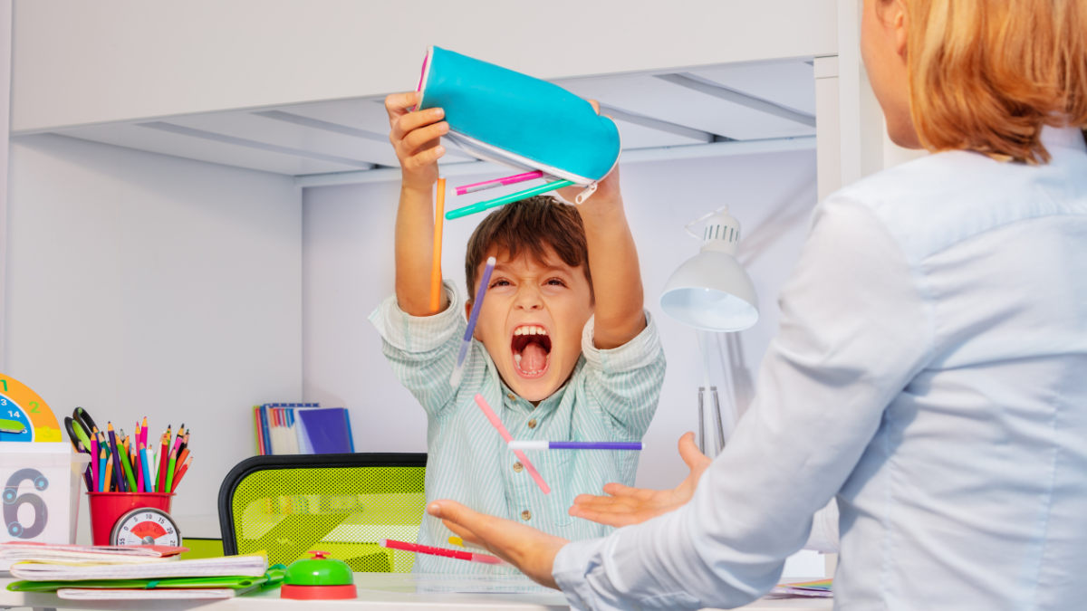 Young client throw pens during play therapy session