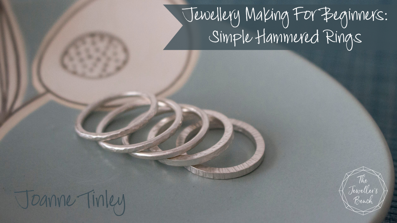 5 simple silver rings on a pale blue plate advertising the simple rings video class