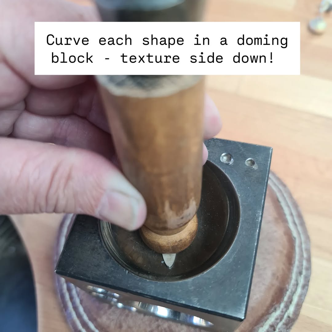 curve each shape in a doming block, putting the textured side down.