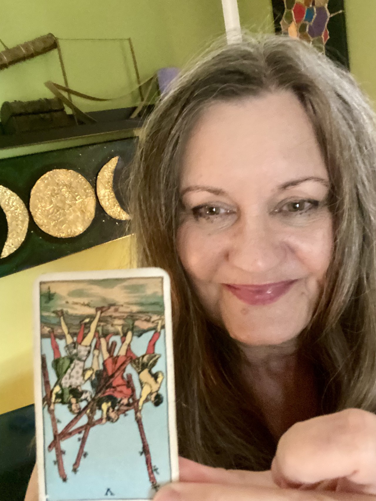 Daniela Hills with a reversed Tarot Card