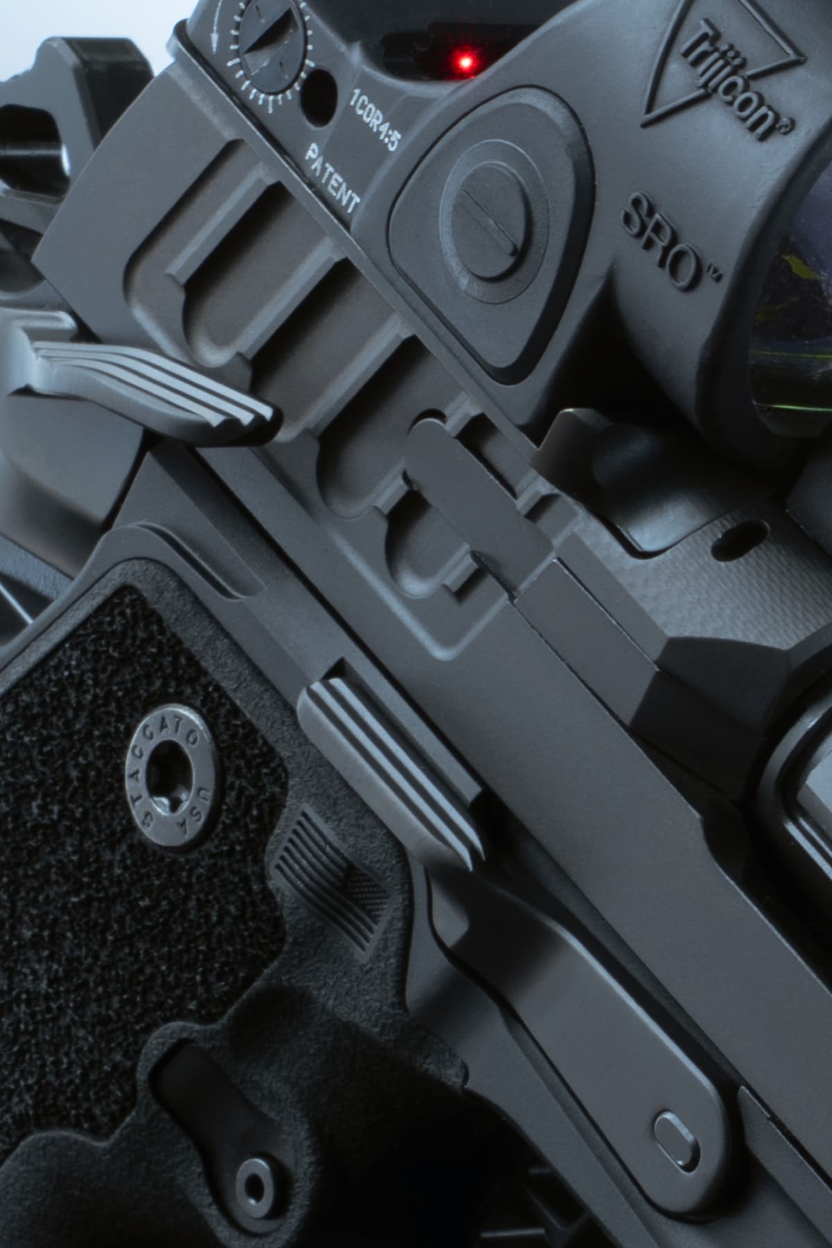 Close-up of a Trijicon SRO seated in the milled cut of a Staccato slide