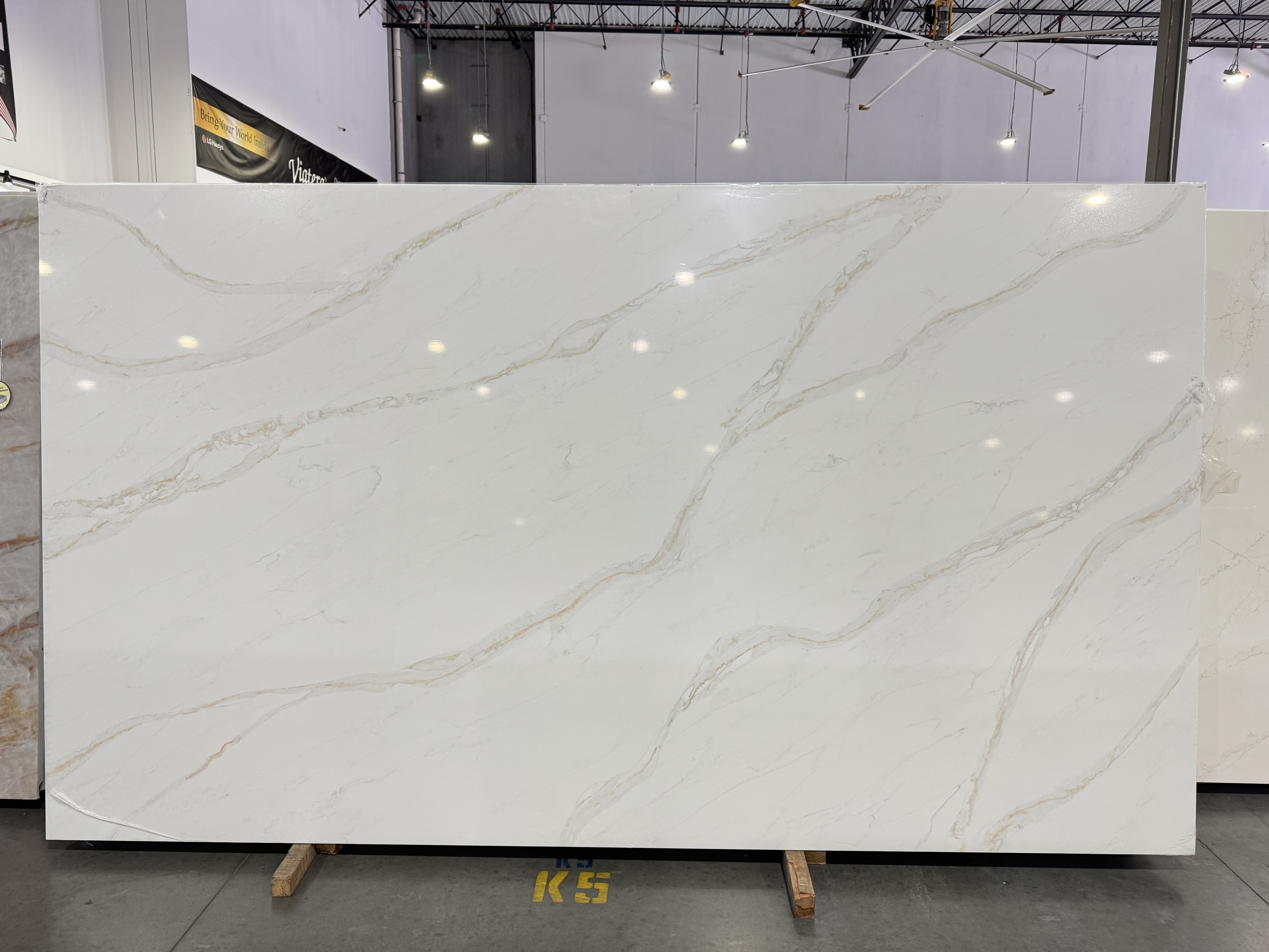 Lot 7258 — 3cm Calacatta Theia Jumbo Quartz