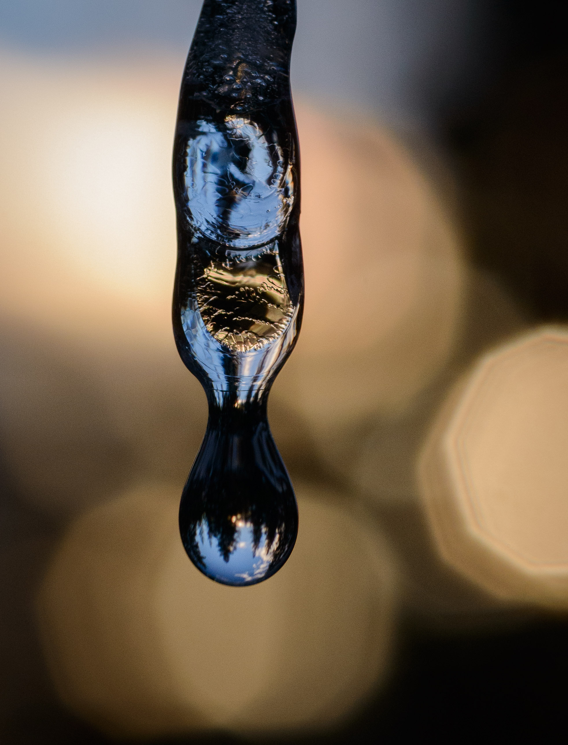 macro shot of dripping icicle