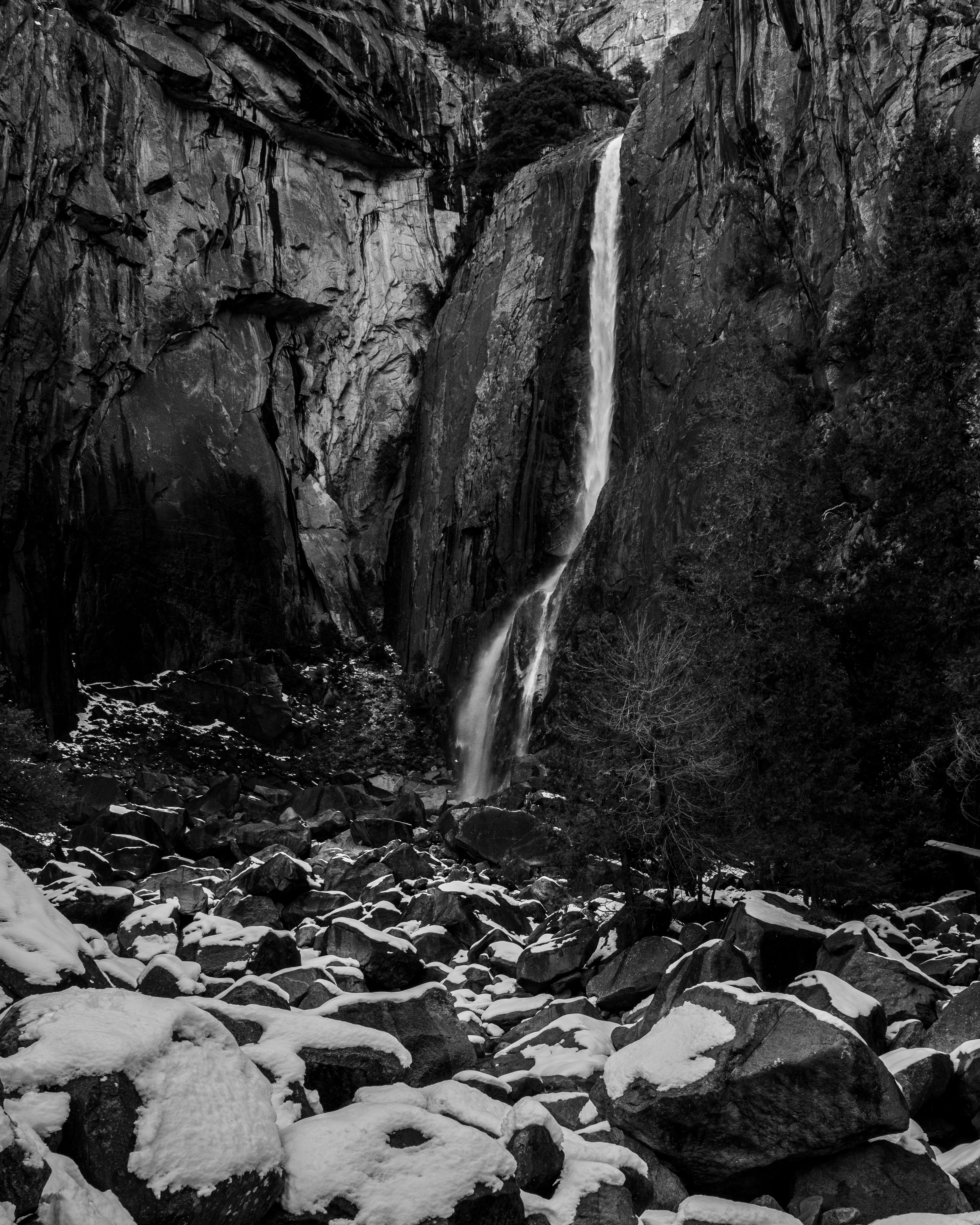 greyscale of yosemite falls in winter