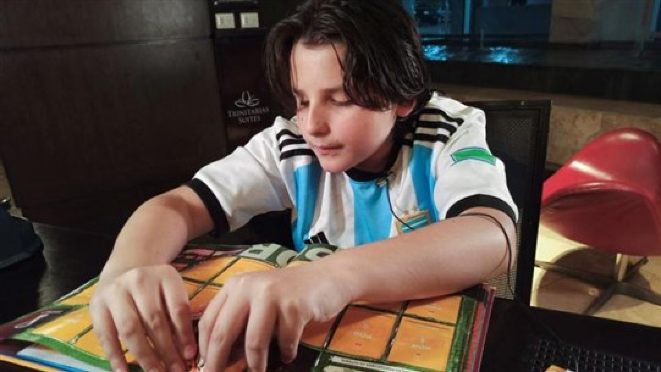 Blind Venezuelan Boy Converts World Cup Sticker Album Into Braille
