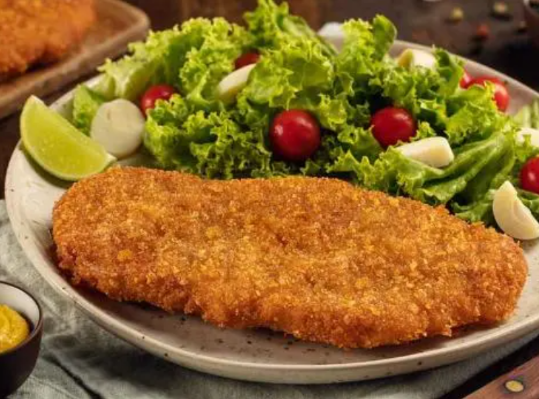Milanesa de cerdo con ensalada