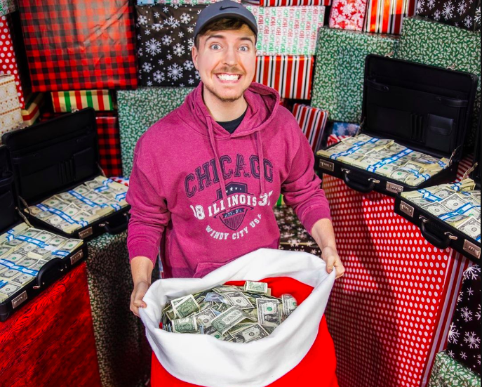 Image of MrBeast holding sack of money