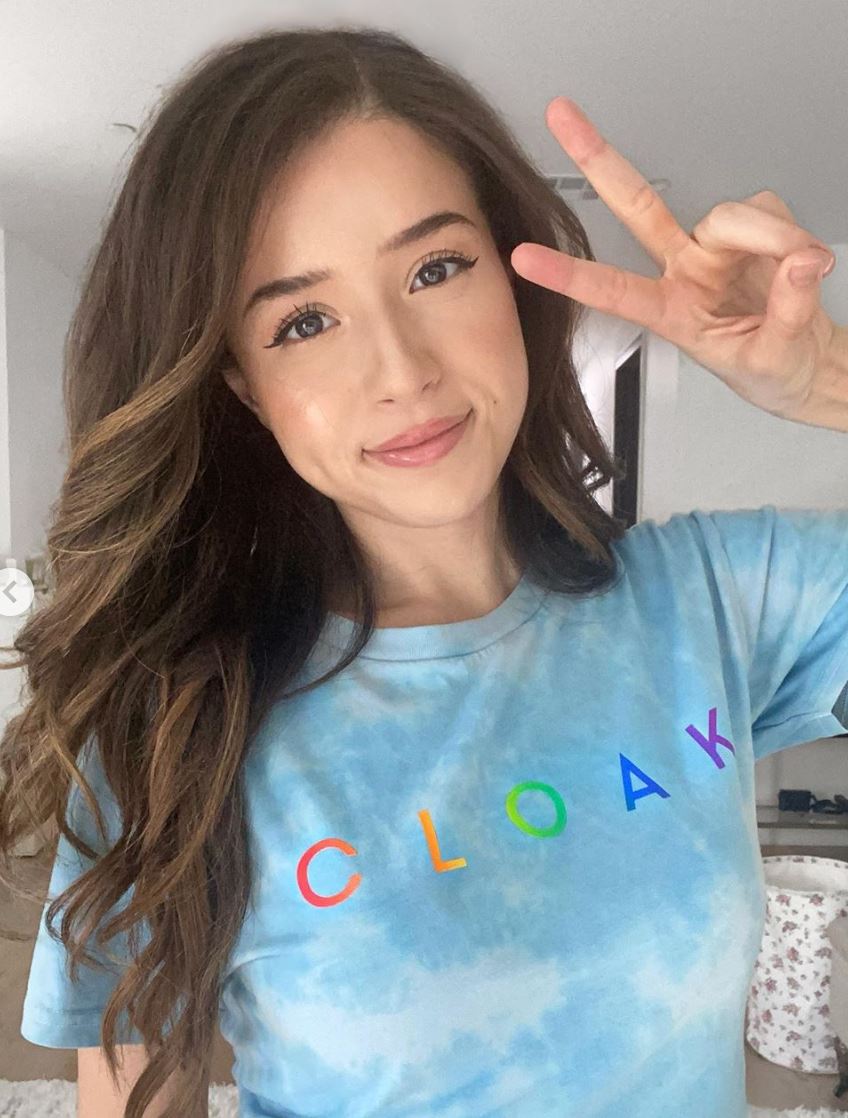 Pokimane models CLOAK merch.