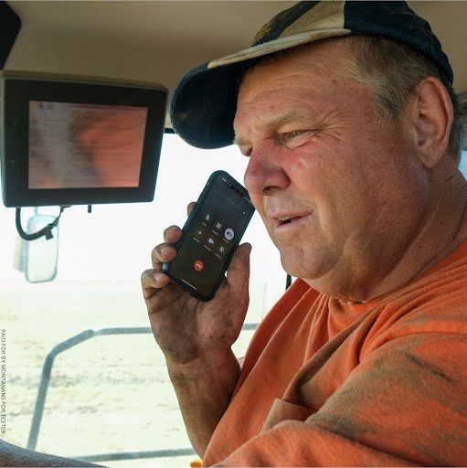 Jon Tester talking on his cellphone Jon Tester talking on his cellphone