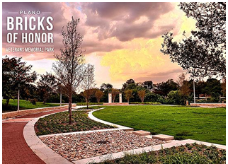 Image of park with brick walkway at sunset