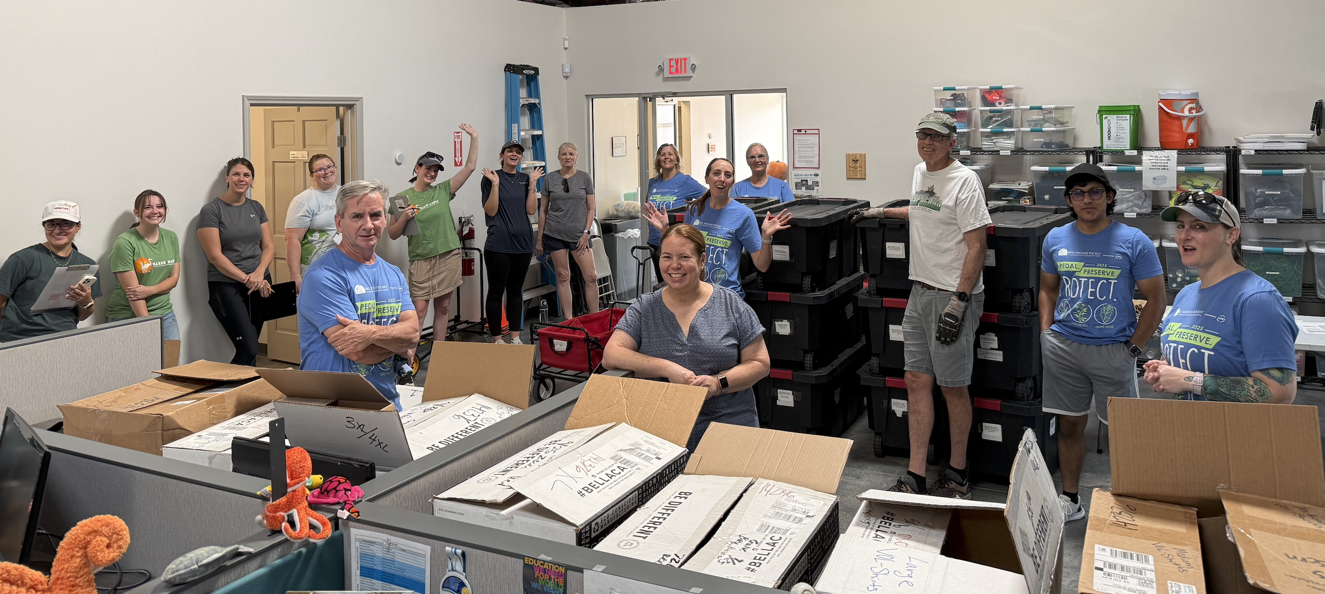 Volunteers helping prepare supplies for Bike Around the Bay