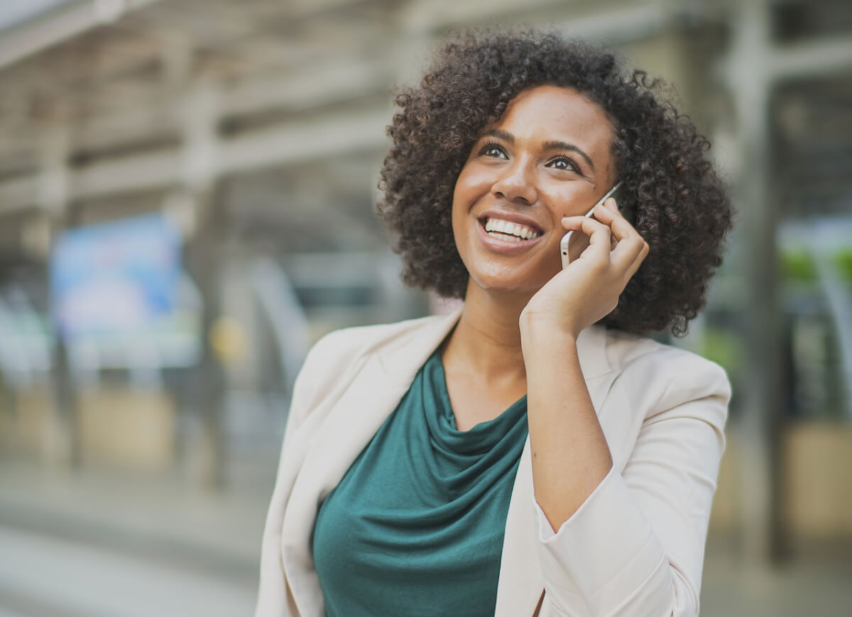 woman listening to voicemails