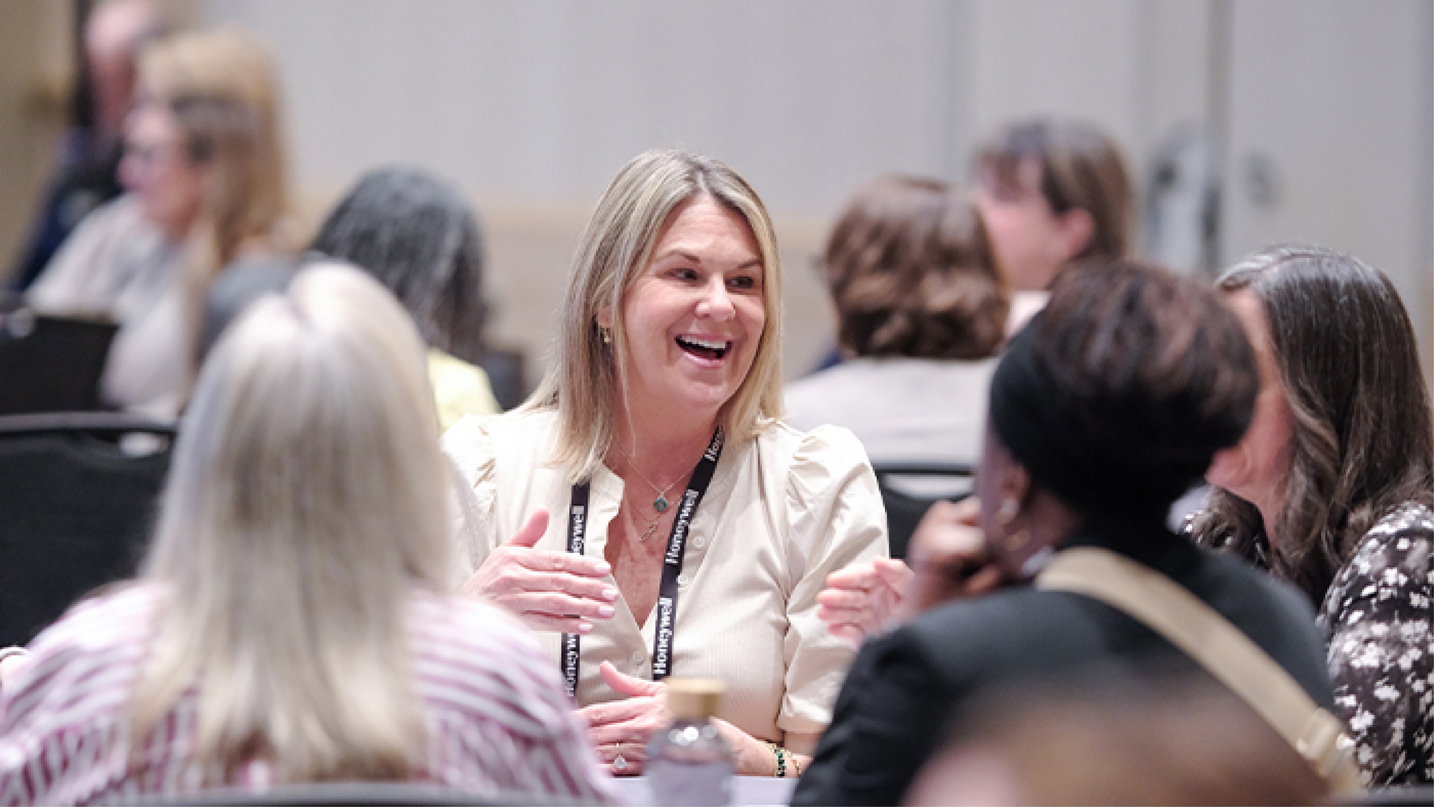Retail supply chain leaders participating in a small-group discussion