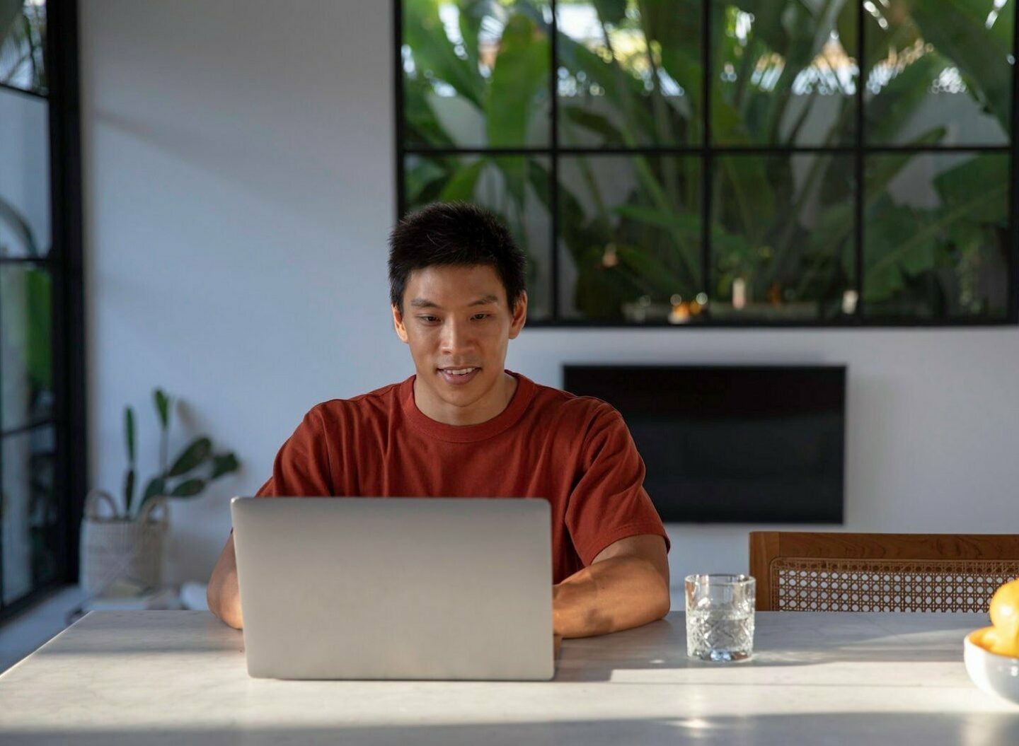 Asian man working from home lemons b