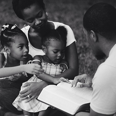 Family with bible 400x400