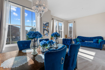 Dining room w/view to living room and side window