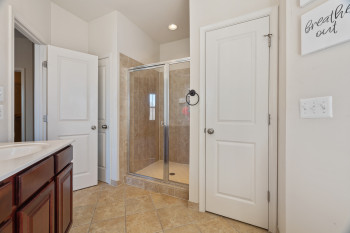 Tile flooring, private water closet, linen closet