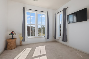 Bedroom #3 - a corner room with 2 large windows