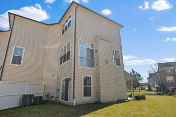 Rear and side yard....it is an end unit.