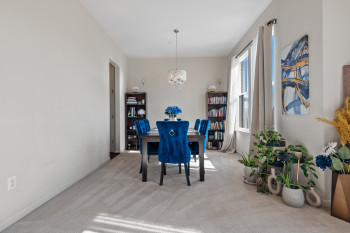 Dining room overlooks front of home. Big windows!