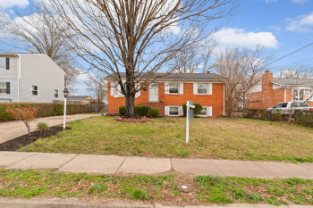 View of front of house with a front yard