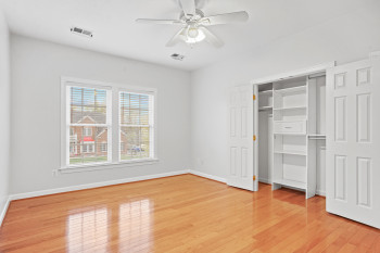 Unfurnished bedroom featuring light hardwood / wood-style floors and ceiling fan