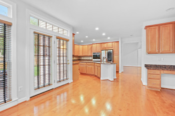 Kitchen with plenty of natural light, stainless steel appliances, and light wood-type flooring