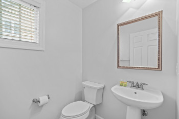 Bathroom featuring sink and toilet