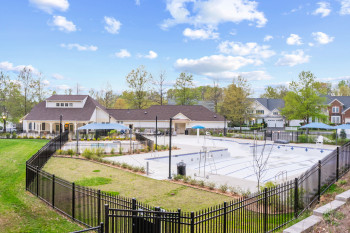Surrounding community with a patio area, a yard, and a pool
