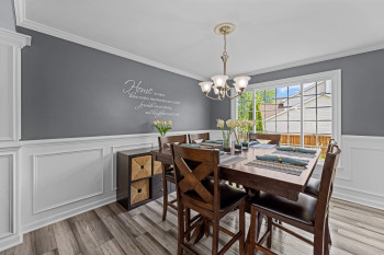 Dining room features an oversized window