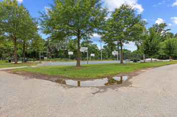 View of property's community with community basketball court