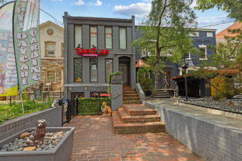 View of front of house featuring brick siding