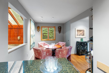 Dining area featuring wood finished floors and baseboards
