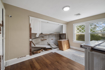 Interior space with wood finished floors and baseboards