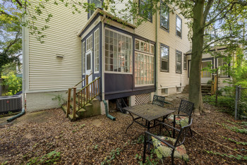 Rear view of house featuring entry steps