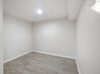 Spare room with wood finished floors and baseboards