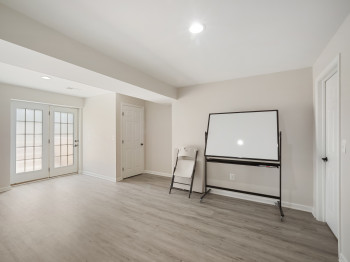 Cinema with recessed lighting and wood finished floors