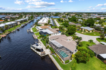 Million-dollar homes down the canal in the basin of yacht club area