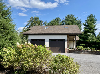 view of garage from barn driveway