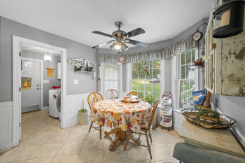 Breakfast area in kitchen showing mudroom/laundry
