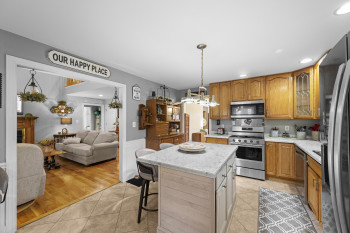 Eat-in kitchen with new range and countertops