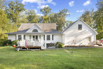 Brand new Trex deck (in-progress during photos); rear of house