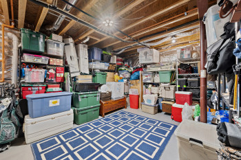 The only unfinished area in this entire home left for storage/workshop if desired
