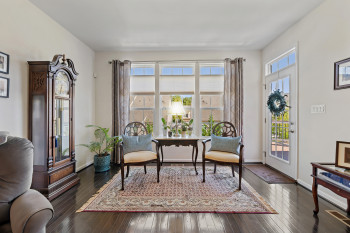 Additional sitting area near the decorative rear door to deck.