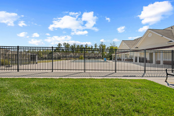View of community pool featuring a patio area and Clubhouse