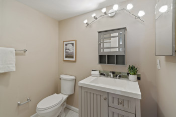 Full master bathroom featuring a walk-in shower