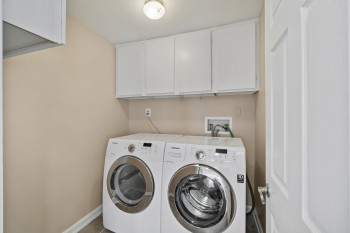 Convenient laundry room located off kitchen