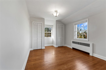 Sunny corner bedroom 2 with generous closet space