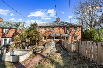 Backyard view to patio and rear of home.