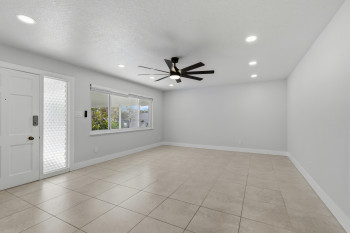 Entrance foyer with recessed lighting, ceiling fan, light tile patterned floors, and a textured ceiling